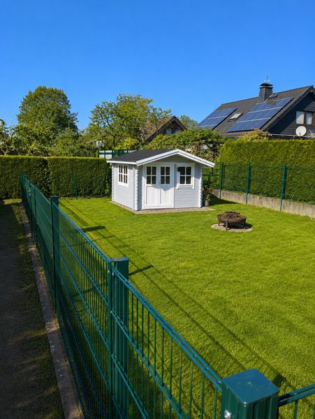 Lichtdurchflutete 3-Zimmer-Wohnung mit eigenem Garten, Balkon & Garage